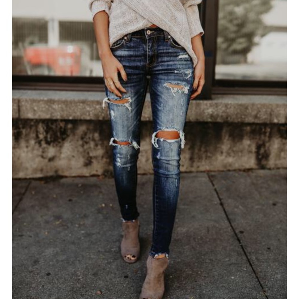 Distressed denim jeans